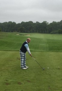 Terry Arnold on the 1st tee. No comment on the trousers allowed....